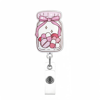 Acrylic Pink Medicine Bottle with a Bow Badge Reel