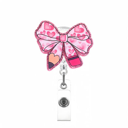 Acrylic Pink Heart with Pencil Bow Badge Reel