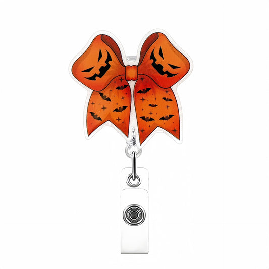 Acrylic Orange Halloween Bow Badge Reel