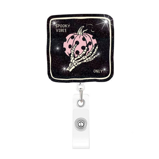 Skeleton Hands Holding Pumpkin Acrylic Badge Reel