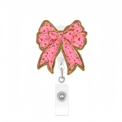 Acrylic Golden Glitter Bow Badge Reel